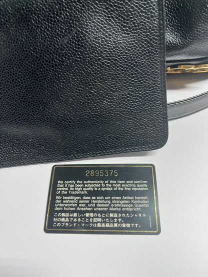 Chanel bucket black leather gold ball shoulder bag