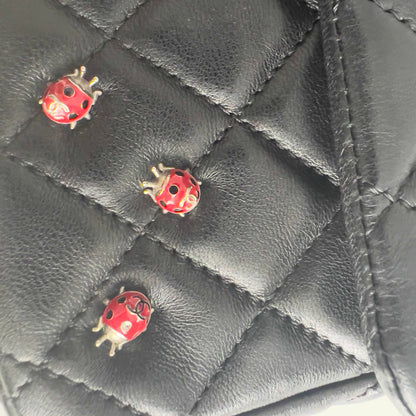 Vintage Chanel Ladybug Flap Bag