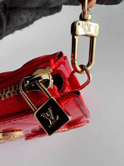 NWOT! Louis Vuitton Orange Sunset Monogram Vernis Lexington Fleurs Pochette Bag
